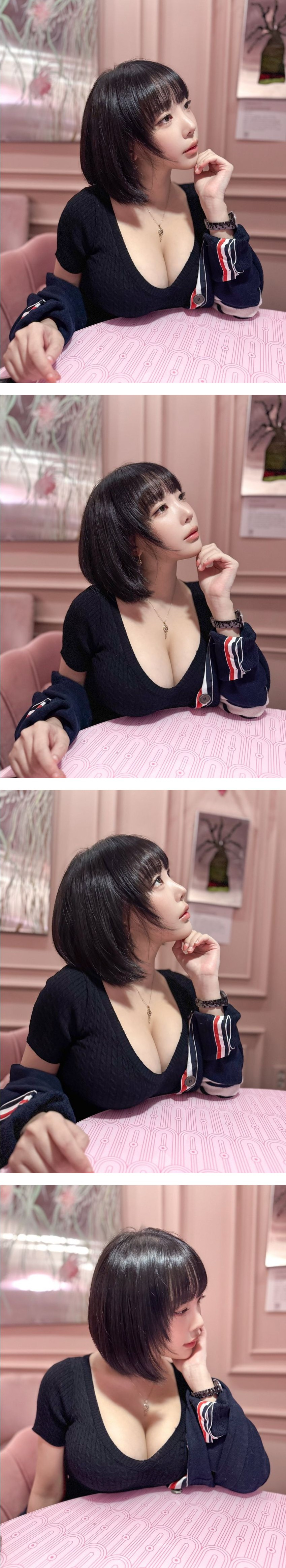 남색 꽈배기 니트 원피스 가슴골 테이블에 올려놓은 강인경