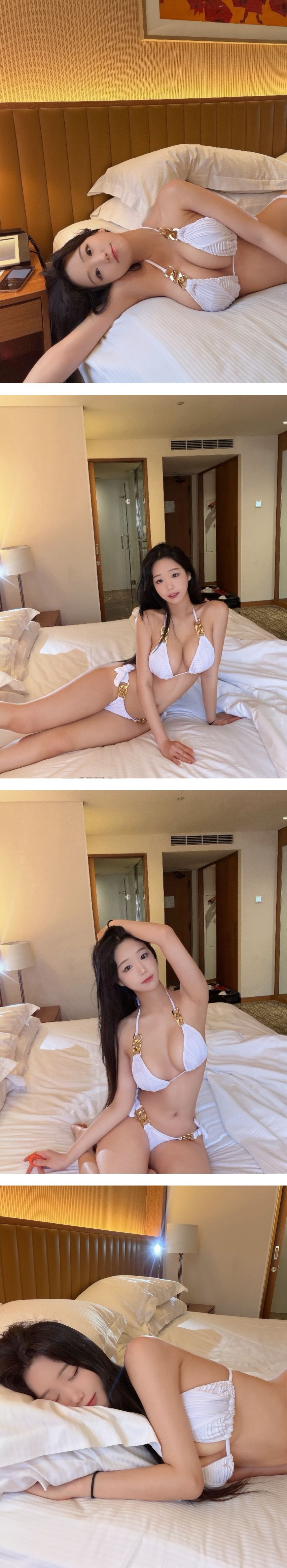 화이트 고리 끈비키니 입고 침대에 누은 에디린 가슴골